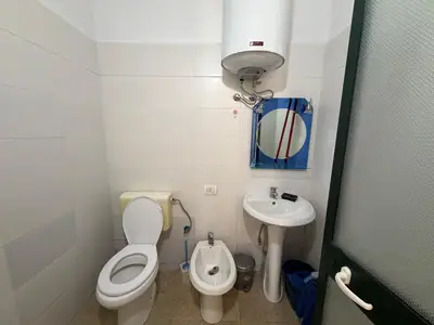 Garsonierë pranë plazhit, 9/11